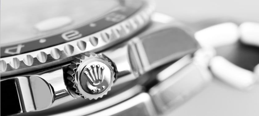  Detailed close-up of a watch in black and white, showcasing its elegant features and craftsmanship.