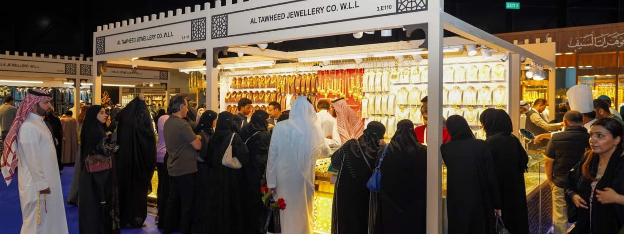 A line of people at a jewellery exhibition