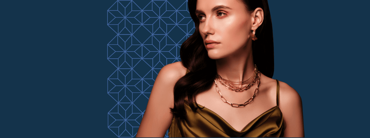 A female model showcasing a luxurious necklace and beautiful earrings.
